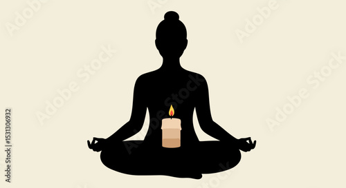Silhouette of woman meditating with candle in front of her