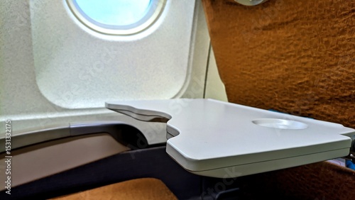 Folding table on airplane seat