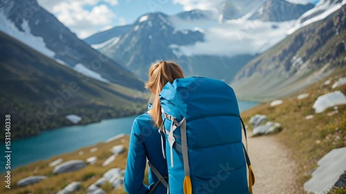 Journey of Exploration: A Woman Embracing Adventure in a Serene Mountain Landscape