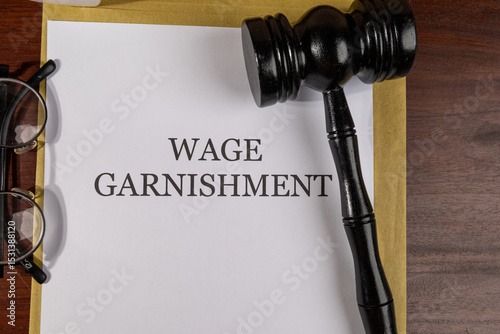 Photos Wage Garnishment Title on Legal Documents Set on Desk – Legal Concept