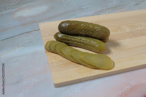 fresh cucumbers on wooden table