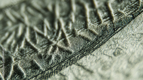 Macro close up of Ben Franklin's face on the US dollar bill.