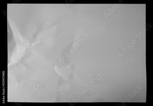 New blank white paper sheet isolated on black background and texture, top view	