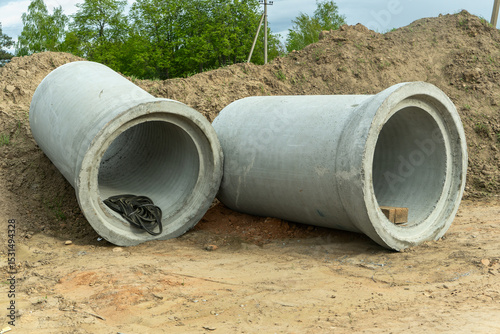 Wallpaper Mural Modern concrete pipes in urban infrastructure: sustainable solutions for drainage system installation and sewage systems. Efficient solutions for sewage and infrastructure development. Torontodigital.ca