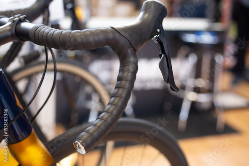 Elegant racing bike handlebars, side view photography. Bicycle design. Side profile of a professional gravel bike. Close-up.
