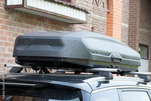 The trunk on the roof of a passenger car. Cargo transportation.