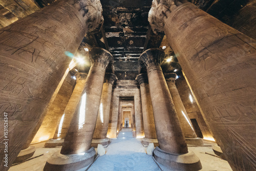 A long hallway adorned with grand columns, Temple of Horus at Edfu, Egypt