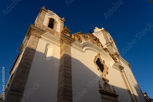 Santo Antonio church in the beautiful city of Lagos in the Algarve region of Portugal at sunset.