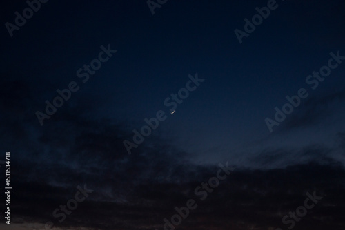 A Very Small Early Moon in the sky