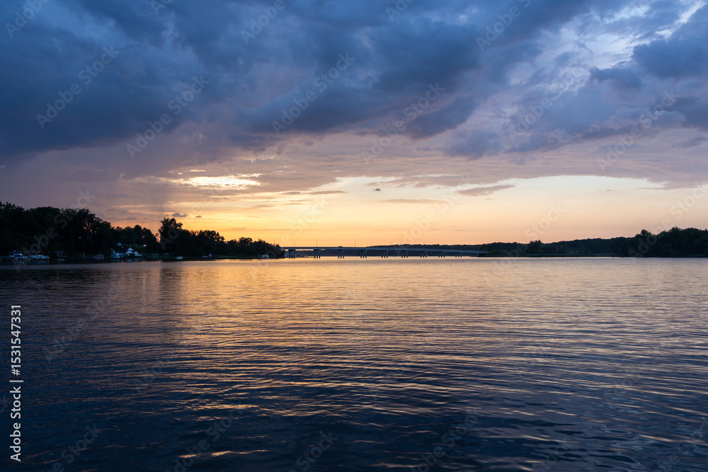 Obraz premium sunset over the river