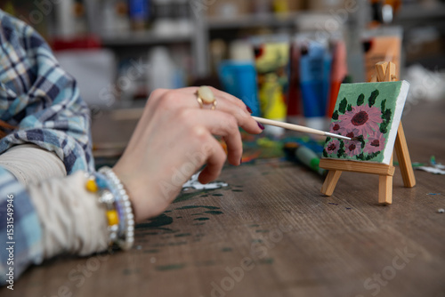 Creative Hands Engaged in a Fun and Enjoyable Painting Activity that Sparks Imagination