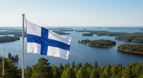 Waving Finnish Flag Symbolizing Land of Thousand Lakes Over the Serene Forested Finnish Lakeland