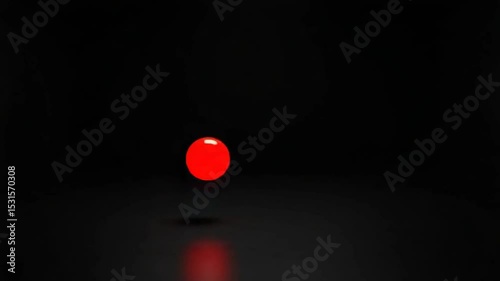 Red Ball Bouncing Animation on Black Surface with a Reflection and Simple Lighting