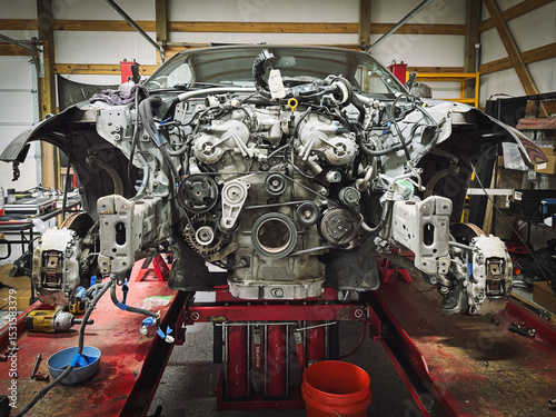 Close-up of an exposed  vehicle Engine in a repair garage