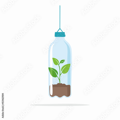 A small plant growing inside a clear plastic bottle hanging from a string, showcasing recycling and sustainability.