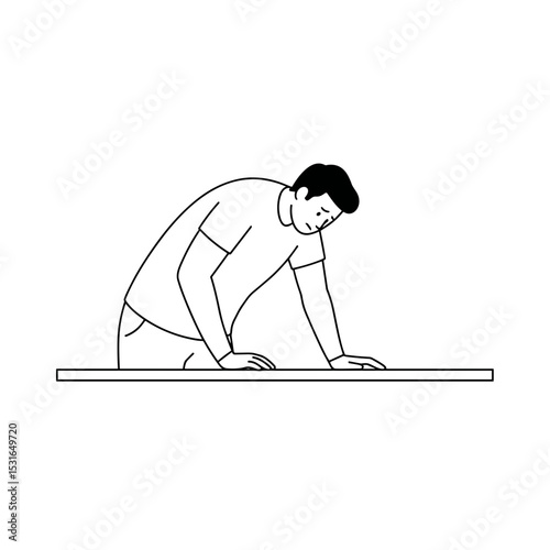 Frustrated man leaning over desk in stress