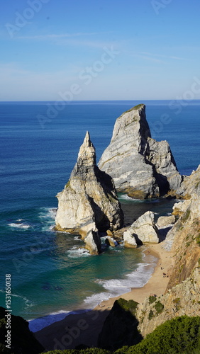 Dramatic coastal rock formations at Praia da Ursa, near Cabo da Roca, Portugal — Europe's westernmost point, featuring clear waters and stunning seascapes.