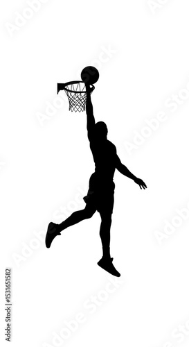 Basketball player dunking ball silhouette in midair