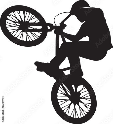 silhouette of a man on a bicycle