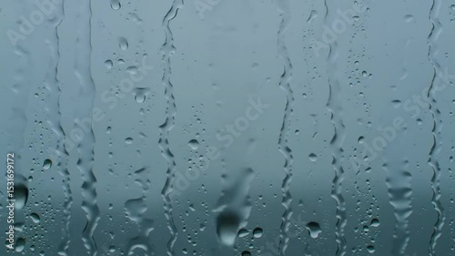 Raindrops on Glass: A Serene Window View