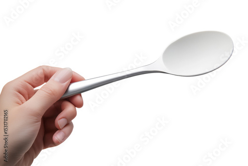 Close-Up of Hand Holding Spoon With Liquid Content on White Background
