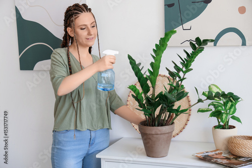 Young woman with dreadlocks...