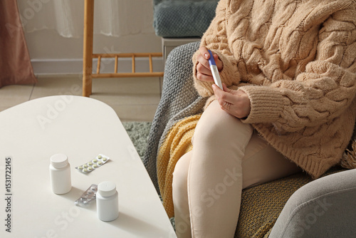 Woman with pregnancy test a...
