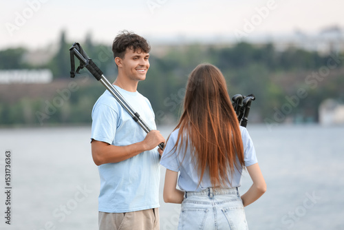Young couple with walking p...