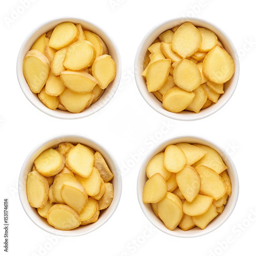 Ginger Root and Slices in a bowl isolated, and Ginger sliced halves in a bowl isolated