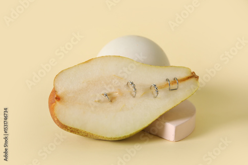 Half of pear with piercing ...