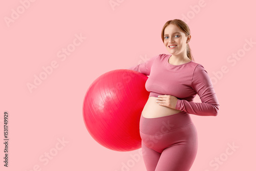 Sporty young pregnant woman...