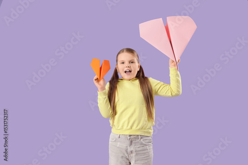 Cute girl with paper planes...