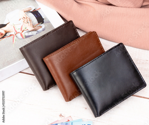 3 pieces of men's leather wallet arranged in a row, perfect for designing a catalog of leather products
