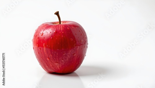 fresh apple with water droplets against white background, subject on left with radiant pink tones in prismatic style, ample copy space on right for photos.