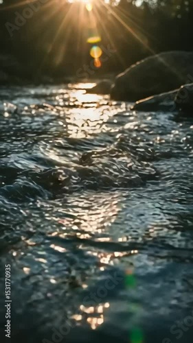 Sunlight reflecting on flowing water
