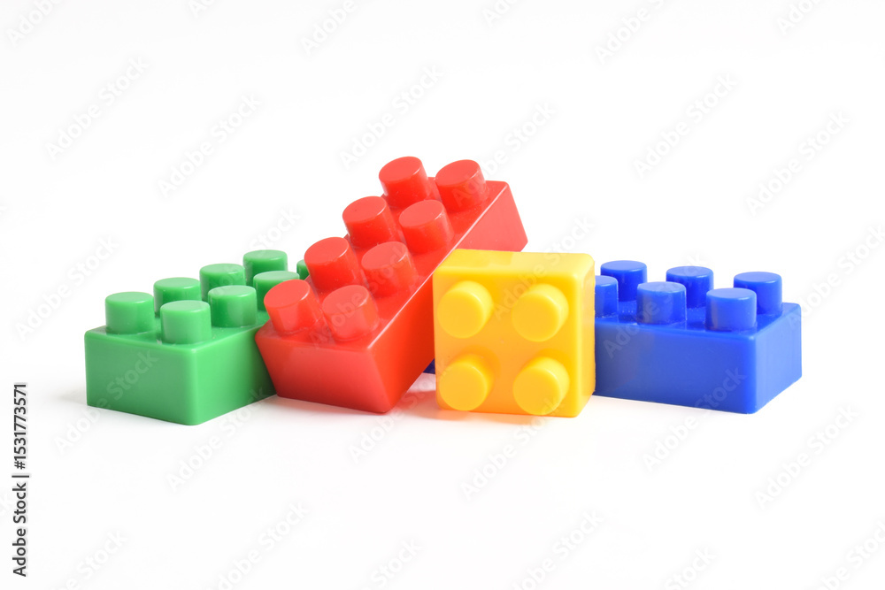 Naklejka premium Plastic building blocks isolated on white background