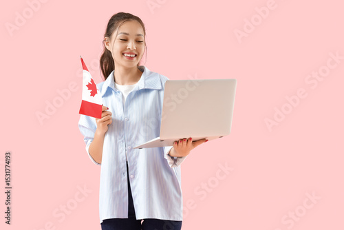 Young Asian woman with lapt...