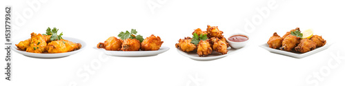 Golden crispy pakora fritters served on white plate on a transparent background
