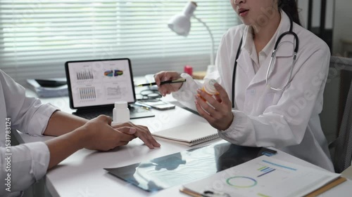 A doctor is talking to a patient about a prescription