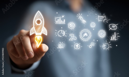 Hand pointing at a rocket illustration with other business ideas.