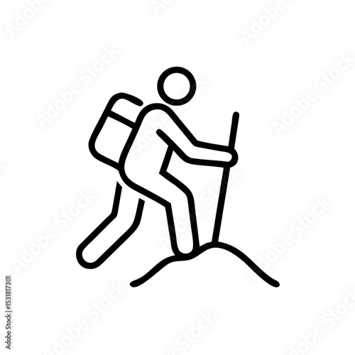 Hiking person with backpack climbing a hill using a walking stick  