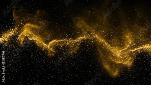 Gold particles in motion on a black background