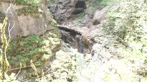 Waterfall Forest Stream Cascading Through Rocks in a Lush Forest