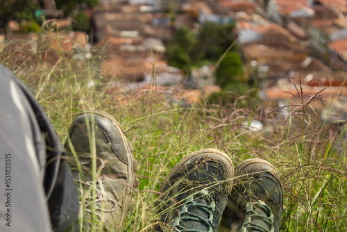 Man and woman resting on the mountain after hiking in the mountains