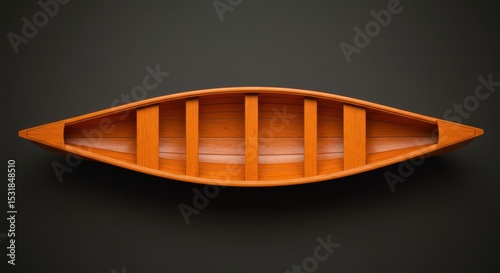Overhead view of empty wooden rowboat on black background
