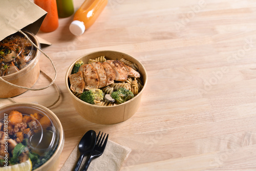 Having a lunch break at the office with delicious Healthy food delivery in take away boxes, Healthy eating concept.