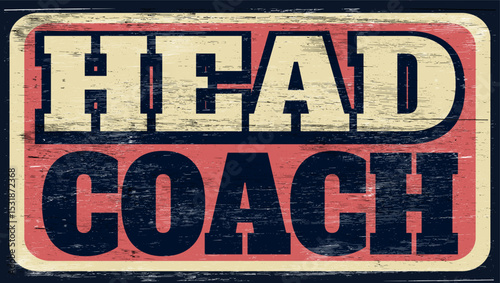 Aged vintage head coach sign on wood
