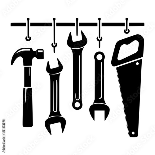 Hand tools hanging on a pegboard