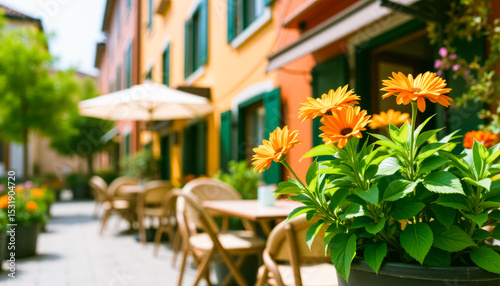 Vibrant orange flowers in colorful alley cafeteria setting