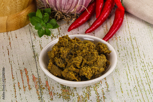 Fototapeta Naklejka Na Ścianę i Meble -  Yellow Thai spicy curry paste